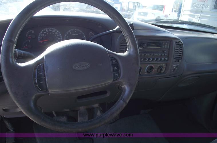 image for item 5437 2002 Ford F150 XLT extended cab pickup truck