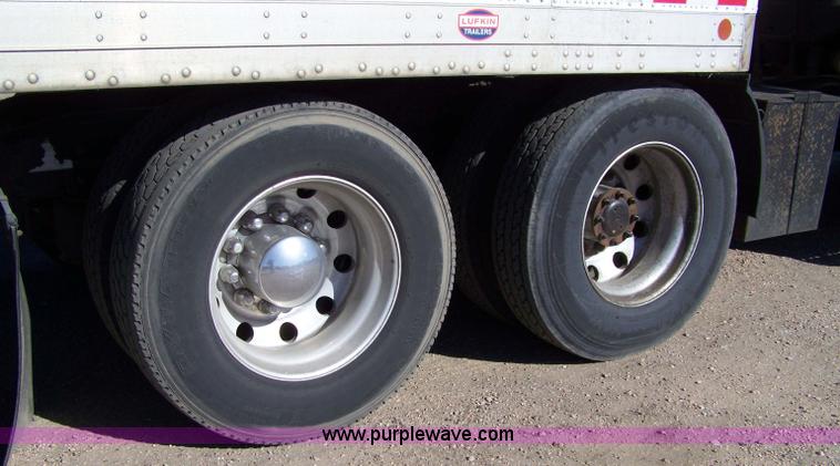 image for item 7500 2003 Freightliner Century Columbia 120 semi truck