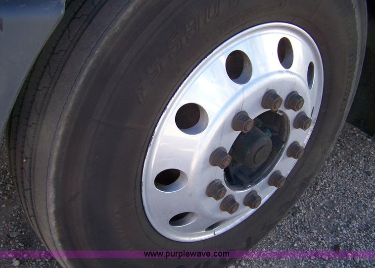 image for item 7504 2003 Freightliner Century Class ST120 semi truck