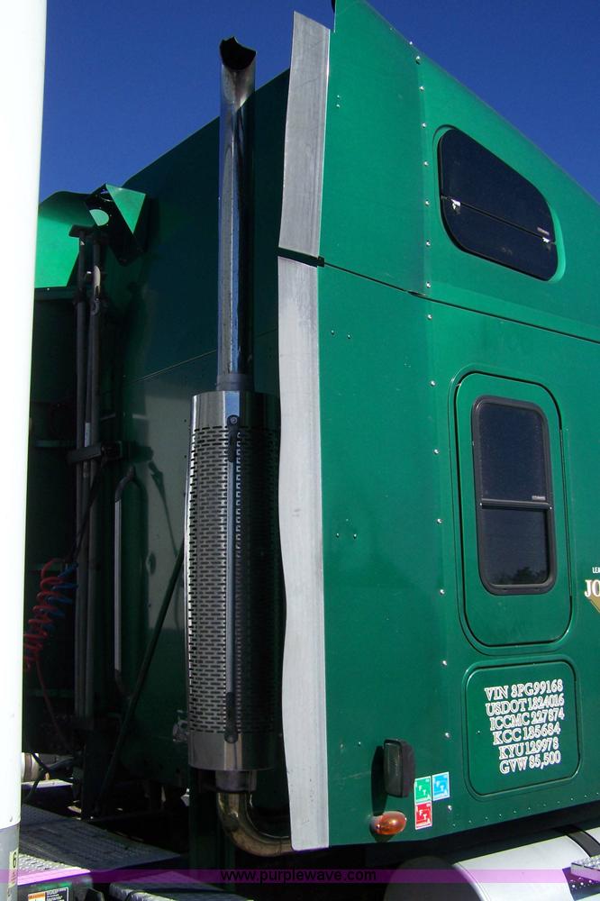image for item 7504 2003 Freightliner Century Class ST120 semi truck