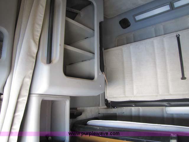 image for item 8278 1999 Freightliner FLD12064ST semi truck