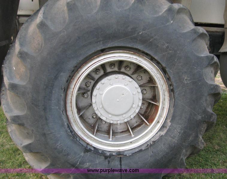 image for item 1702 1984 Ford 8000 spreader truck