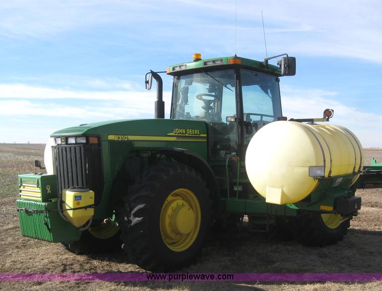image for item 3038 2000 John Deere 8310 MFWD tractor