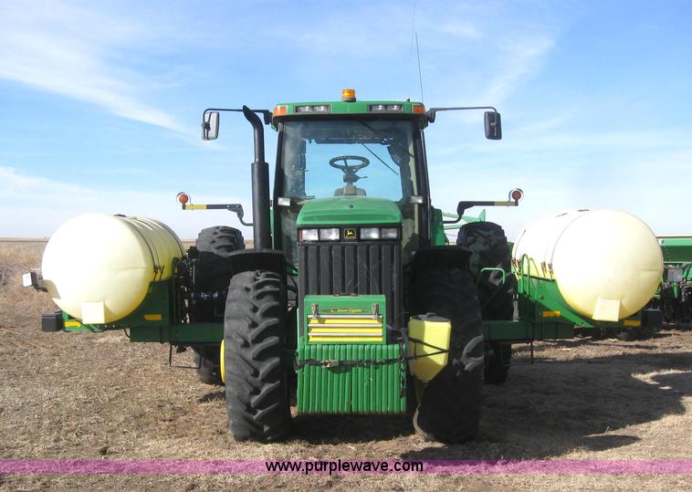 image for item 3038 2000 John Deere 8310 MFWD tractor