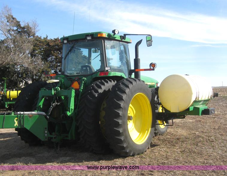 image for item 3038 2000 John Deere 8310 MFWD tractor