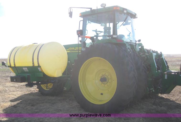 image for item 3038 2000 John Deere 8310 MFWD tractor