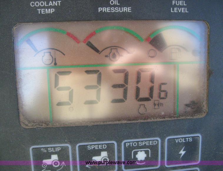 image for item 3038 2000 John Deere 8310 MFWD tractor