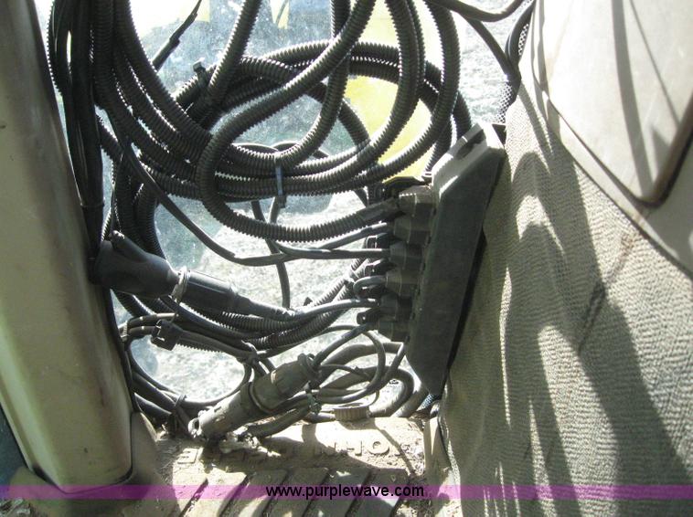 image for item 3038 2000 John Deere 8310 MFWD tractor