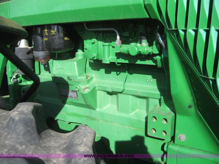 image for item 3038 2000 John Deere 8310 MFWD tractor