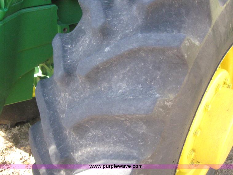 image for item 3038 2000 John Deere 8310 MFWD tractor
