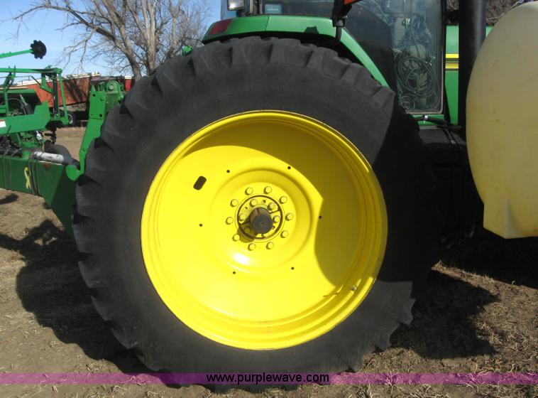 image for item 3038 2000 John Deere 8310 MFWD tractor