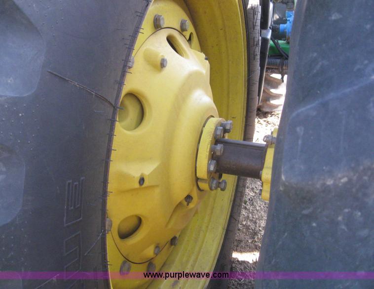 image for item 3038 2000 John Deere 8310 MFWD tractor