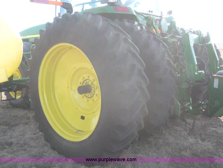 image for item 3038 2000 John Deere 8310 MFWD tractor