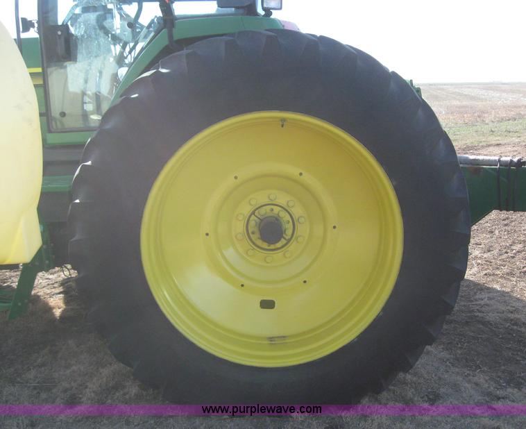 image for item 3038 2000 John Deere 8310 MFWD tractor
