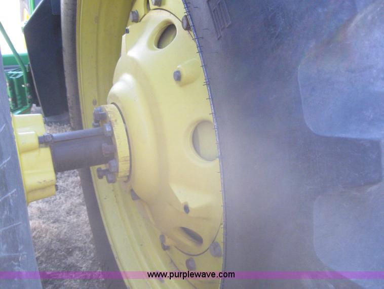 image for item 3038 2000 John Deere 8310 MFWD tractor