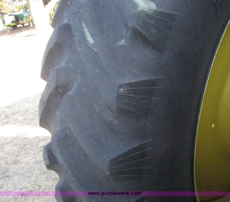 image for item 3038 2000 John Deere 8310 MFWD tractor