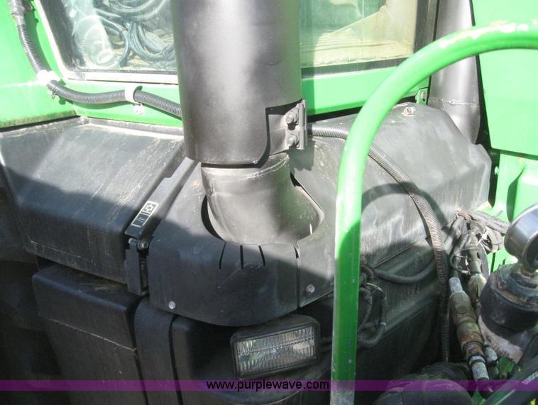 image for item 3038 2000 John Deere 8310 MFWD tractor