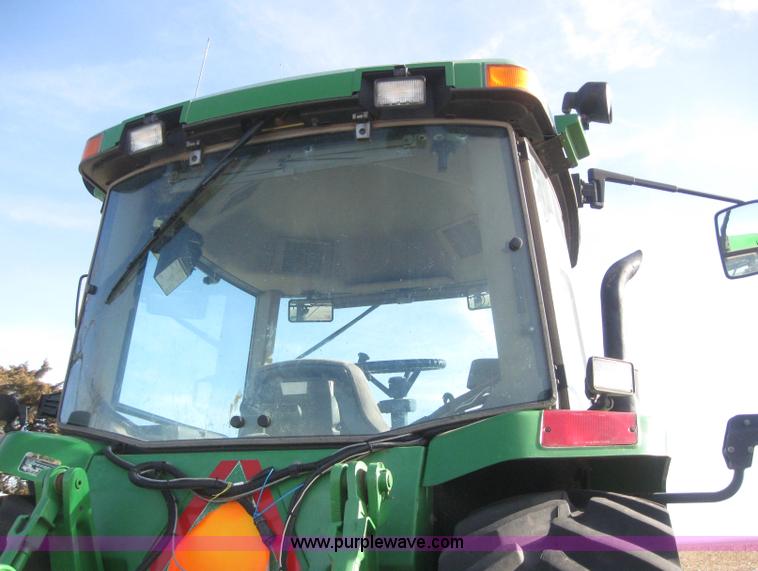 image for item 3038 2000 John Deere 8310 MFWD tractor