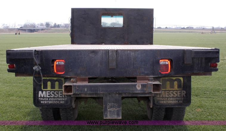 image for item 4814 1988 Ford F700 flatbed truck