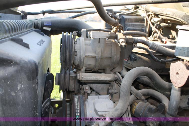image for item 4814 1988 Ford F700 flatbed truck