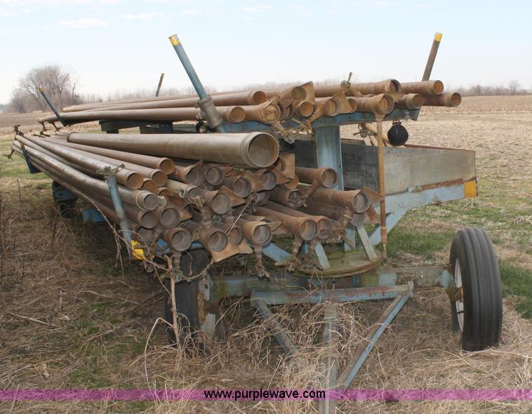image for item 4907 Irrigation pipe and trailer