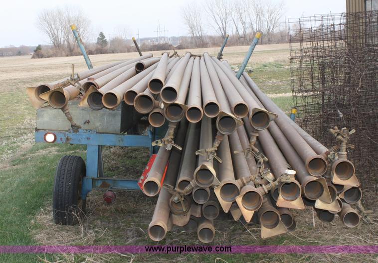 image for item 4907 Irrigation pipe and trailer