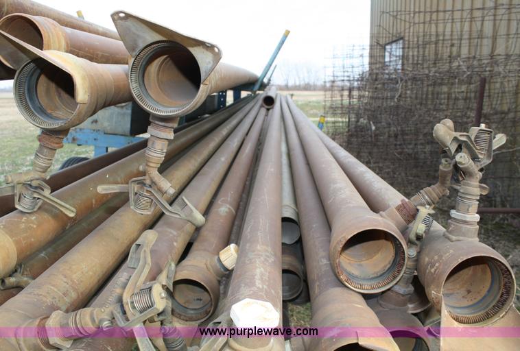 image for item 4907 Irrigation pipe and trailer