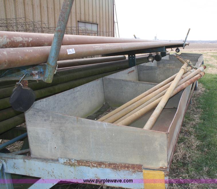 image for item 4907 Irrigation pipe and trailer