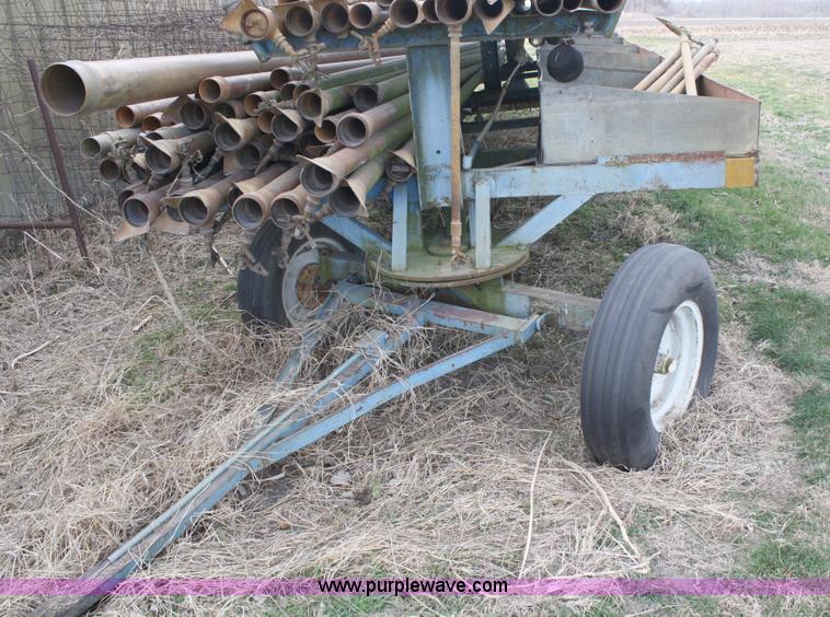 image for item 4907 Irrigation pipe and trailer