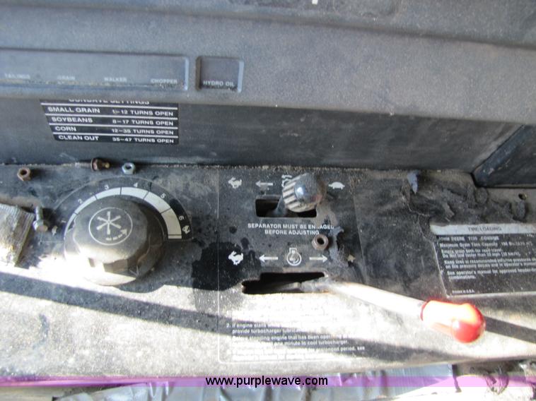 image for item 5142 1983 John Deere 7720 combine