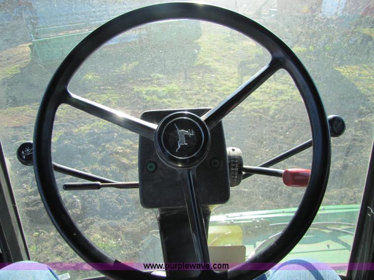 image for item 5142 1983 John Deere 7720 combine