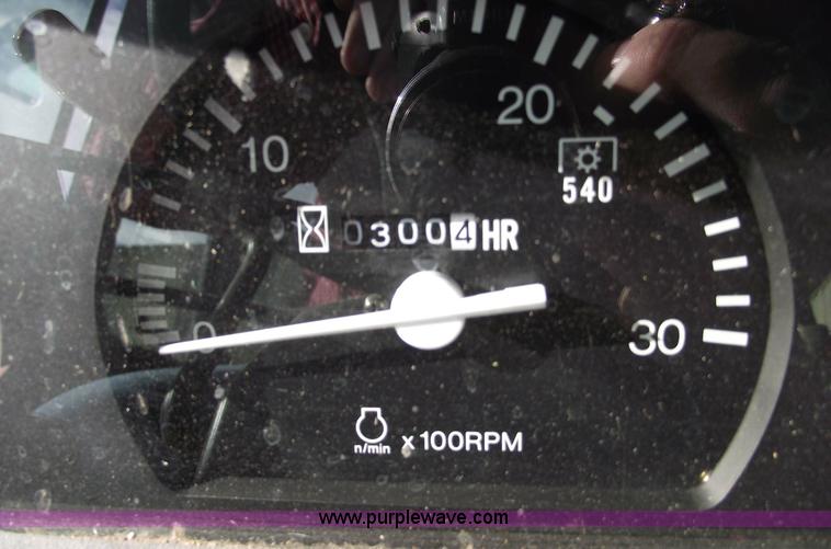 image for item 5452 2006 Kubota M5700 4WD cab tractor