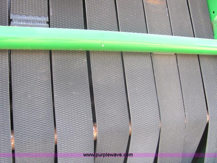 image for item 6764 2004 John Deere 567 round baler