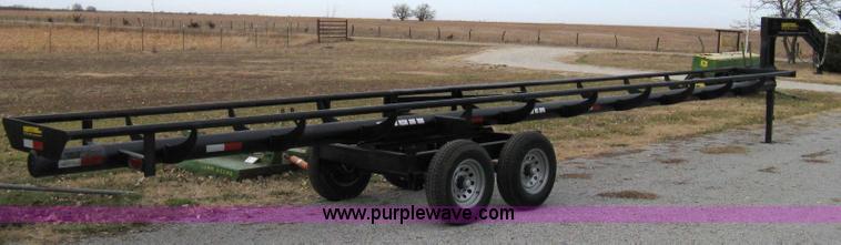 image for item 8081 2010 Competitor Hay Handler 36' inline self-dump round bale trailer