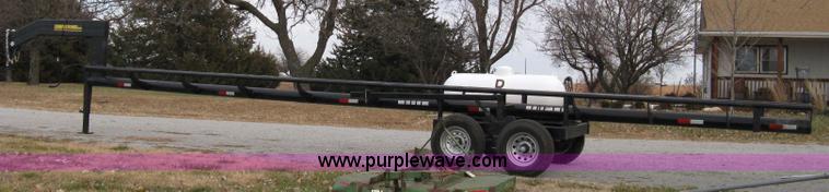 image for item 8081 2010 Competitor Hay Handler 36' inline self-dump round bale trailer