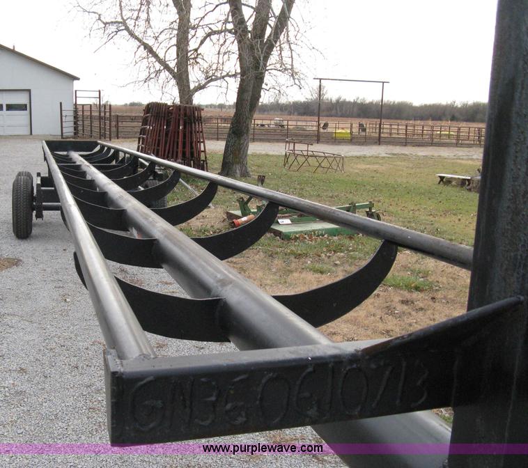 image for item 8081 2010 Competitor Hay Handler 36' inline self-dump round bale trailer