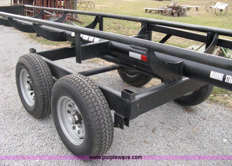 image for item 8081 2010 Competitor Hay Handler 36' inline self-dump round bale trailer