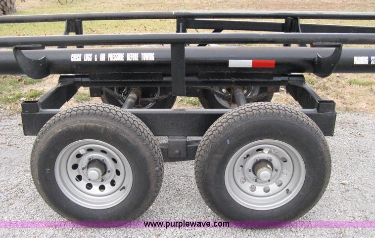 image for item 8081 2010 Competitor Hay Handler 36' inline self-dump round bale trailer