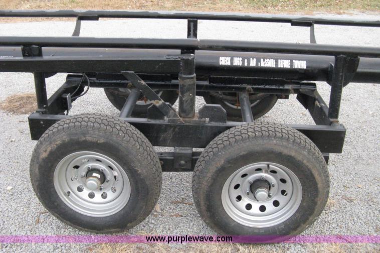 image for item 8081 2010 Competitor Hay Handler 36' inline self-dump round bale trailer