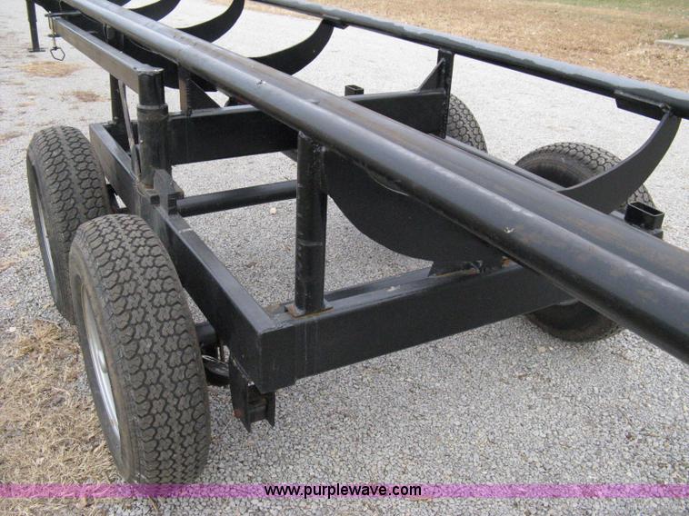 image for item 8081 2010 Competitor Hay Handler 36' inline self-dump round bale trailer