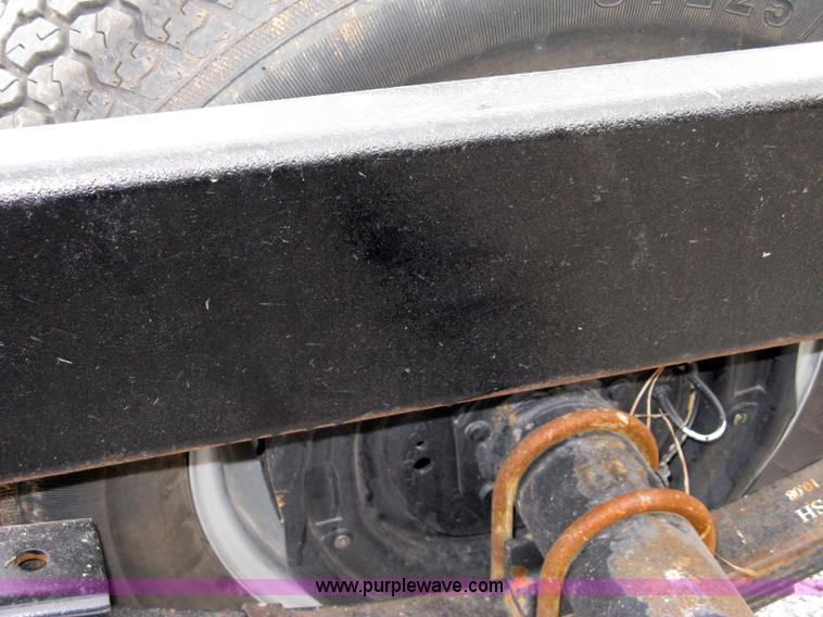 image for item 8081 2010 Competitor Hay Handler 36' inline self-dump round bale trailer