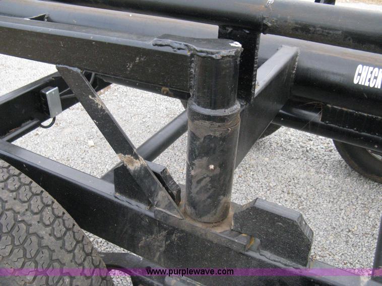 image for item 8081 2010 Competitor Hay Handler 36' inline self-dump round bale trailer