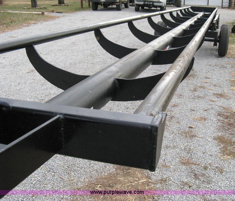 image for item 8081 2010 Competitor Hay Handler 36' inline self-dump round bale trailer