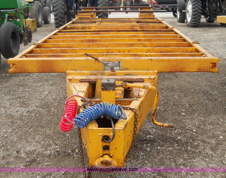 image for item 1000 1979 Trail-Eze 29' dual axle flat bed trailer