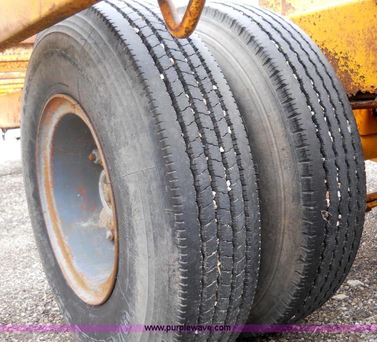 image for item 1000 1979 Trail-Eze 29' dual axle flat bed trailer