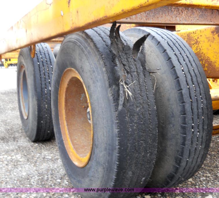 image for item 1000 1979 Trail-Eze 29' dual axle flat bed trailer