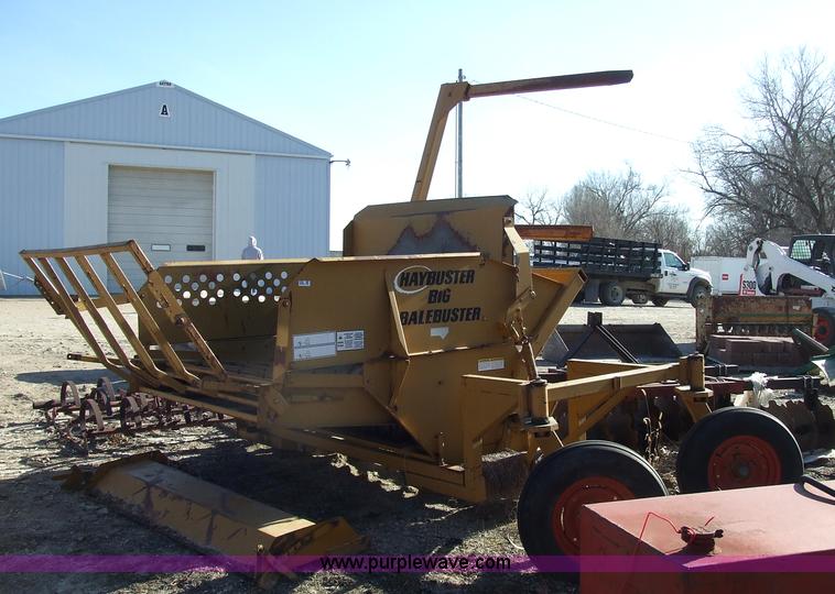 image for item 2358 1995 HayBuster 256 big bale buster with deflector shield