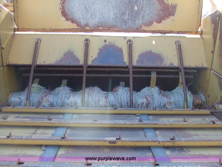 image for item 2358 1995 HayBuster 256 big bale buster with deflector shield