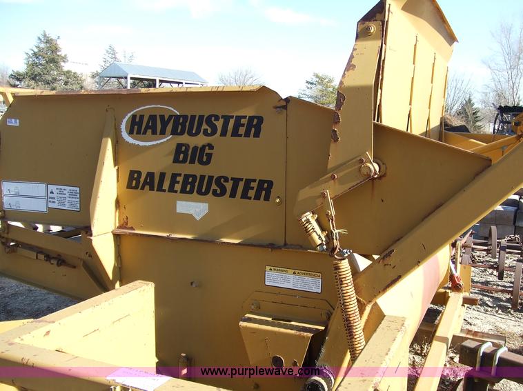 image for item 2358 1995 HayBuster 256 big bale buster with deflector shield