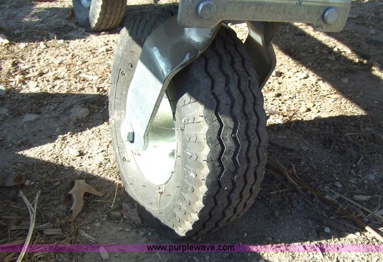 image for item 2361 Cyclone pull-behind leaf rake vacuum for riding mower